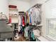 Walk-in closet with clothing racks and shelving, offering ample storage space and an organized layout at 2413 Whelen Dr, Graham, NC 27253