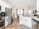 Modern kitchen featuring stainless appliances, granite countertops, and a center island at 2413 Whelen Dr, Graham, NC 27253