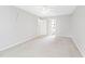 Neutral bedroom with carpet flooring, ample space, and doorways to other rooms at 2419 Pepperstone Dr, Graham, NC 27253