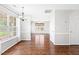 Cozy dining area with natural light, hardwood floors, and access to living spaces at 2419 Pepperstone Dr, Graham, NC 27253