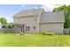 The home features a well-maintained yard and a backyard patio with a fire pit for outdoor enjoyment at 2419 Pepperstone Dr, Graham, NC 27253
