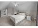 Comfortable bedroom features neutral decor, and convenient access to the bathroom at 31 Sweet Birch Ave, Zebulon, NC 27597