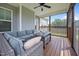 Relaxing screened-in porch with outdoor furniture at 31 Sweet Birch Ave, Zebulon, NC 27597