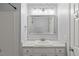 Bathroom features an updated sink, faucet, and modern mirror at 3100 Berkeley Springs Pl, Raleigh, NC 27616