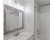Updated bathroom includes a sink and a shower with glass doors at 3100 Berkeley Springs Pl, Raleigh, NC 27616