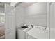 Bright laundry room with washer and dryer at 3100 Berkeley Springs Pl, Raleigh, NC 27616