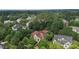 Aerial view of a home nestled in a lush, green neighborhood surrounded by mature trees at 3311 Canoe Brook Pkwy, Raleigh, NC 27614