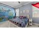Colorful bedroom featuring unique wall art, natural light and neutral paint at 3311 Canoe Brook Pkwy, Raleigh, NC 27614