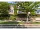 Beautiful home showcasing light brick, manicured landscaping, and architectural details at 3311 Canoe Brook Pkwy, Raleigh, NC 27614