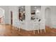 Kitchen bar featuring white stools, connecting to the kitchen at 3311 Canoe Brook Pkwy, Raleigh, NC 27614