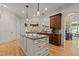 Spacious kitchen island offers granite countertops, cabinet storage and open sight lines at 3311 Canoe Brook Pkwy, Raleigh, NC 27614