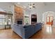 Spacious living room with stone fireplace and hardwood floors at 3311 Canoe Brook Pkwy, Raleigh, NC 27614