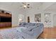Bright living room features coffered ceilings and flows to kitchen at 3311 Canoe Brook Pkwy, Raleigh, NC 27614