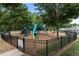 Community playground featuring mulch ground cover, slides, and other play structures at 3311 Canoe Brook Pkwy, Raleigh, NC 27614
