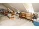 Unfinished attic features dormer windows providing natural light and additional space at 334 Dell Meadows Pl, Four Oaks, NC 27524