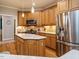 Updated kitchen featuring stainless steel appliances, granite counters and central island at 334 Dell Meadows Pl, Four Oaks, NC 27524
