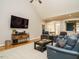 Comfortable living room showcasing a vaulted ceiling, hardwood floors, and stylish furniture at 334 Dell Meadows Pl, Four Oaks, NC 27524