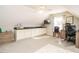 Open office space with built-in storage, desk, and plenty of natural light at 334 Dell Meadows Pl, Four Oaks, NC 27524