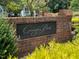 Brick community sign reading 