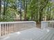 Inviting outdoor deck, perfect for relaxing, with views of the surrounding greenery at 3811 Carnegie Ln, Raleigh, NC 27612