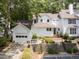 Charming two-story home with landscaped front yard and detached garage at 3811 Carnegie Ln, Raleigh, NC 27612
