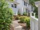View of home's exterior and walkway leading to front porch at 3811 Carnegie Ln, Raleigh, NC 27612
