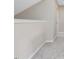 Cozy hallway with neutral walls, white trim, and plush carpeting at 3811 Carnegie Ln, Raleigh, NC 27612