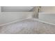 Spacious hallway with plush carpeting and neutral paint offers a welcoming transition between rooms at 3811 Carnegie Ln, Raleigh, NC 27612