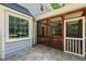 Exterior shot of screened porch and patio, great for outdoor living at 3821 Whispering Branch Rd, Raleigh, NC 27613