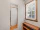 Walk-in closet showing mirror and shelving at 3821 Whispering Branch Rd, Raleigh, NC 27613