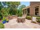 Backyard patio with outdoor kitchen and dining area, perfect for entertaining guests at 401 Westbury Dr, Chapel Hill, NC 27516