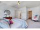 A bright bedroom features neutral carpet, a ceiling fan, and crown moulding at 401 Westbury Dr, Chapel Hill, NC 27516