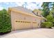 Attached two-car garage with ample parking and well-maintained brick exterior at 401 Westbury Dr, Chapel Hill, NC 27516