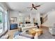 Comfortable living room with hardwood floors, lots of light, that connects to the dining and kitchen areas at 401 Westbury Dr, Chapel Hill, NC 27516