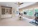 Home office featuring built-in bookshelves, lots of light, and ample workspace at 401 Westbury Dr, Chapel Hill, NC 27516