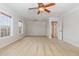 Large carpeted bedroom with natural light and neutral walls at 410 Stranraer Ct, Fuquay Varina, NC 27526