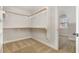 Walk-in closet with shelving and carpeted floor at 410 Stranraer Ct, Fuquay Varina, NC 27526