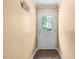 Clean entryway featuring tiled floors, light-colored walls and an exterior door with glass panes at 410 W Tenth St, Siler City, NC 27344