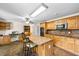 Large kitchen with a center island and ample counter space for cooking and prep at 410 W Tenth St, Siler City, NC 27344