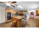 Spacious kitchen with an island, stainless appliances, and tile flooring at 410 W Tenth St, Siler City, NC 27344