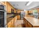 Spacious kitchen with granite countertops, stainless steel appliances and custom cabinets at 410 W Tenth St, Siler City, NC 27344