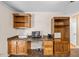 Office space includes built-in desk, drawers, cabinets, and shelving for storage and organization at 410 W Tenth St, Siler City, NC 27344
