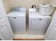 Functional laundry area with a Maytag washer and dryer, offering convenience at 412 Onondaga Ct, Holly Springs, NC 27540