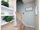 Bright staircase with decor, leading to the upper level at 412 Onondaga Ct, Holly Springs, NC 27540