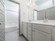 Modern bathroom with a double vanity, sleek fixtures, and a shower-tub combination at 425 Sunny Field Dr., Wake Forest, NC 27587