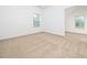 Bright, spacious bedroom with neutral carpet, large windows, and plenty of natural light at 425 Sunny Field Dr., Wake Forest, NC 27587