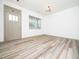 Inviting space with wood-look floors, bright lighting, and a large window at 425 Sunny Field Dr., Wake Forest, NC 27587