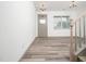Spacious living room with wood-look floors, neutral paint, and natural light at 425 Sunny Field Dr., Wake Forest, NC 27587