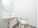 Stylish powder room with a pedestal sink and modern fixtures at 425 Sunny Field Dr., Wake Forest, NC 27587