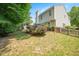 Lawn with mature trees and a view of the home at 4524 Drewbridge Way, Raleigh, NC 27604